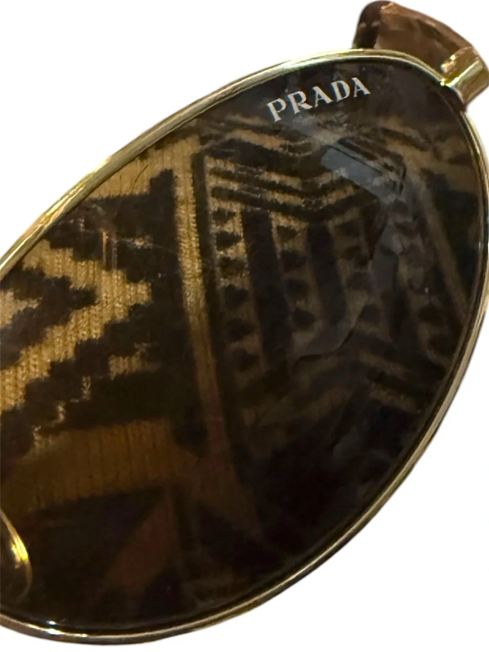 Prada PR A59S Women’s Gold Oval Sunglasses